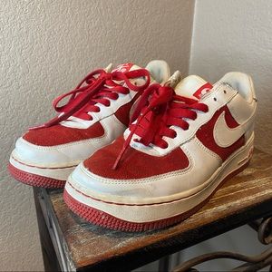 Red and white Nike Air Force 1 sneakers need new insoles